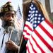 Veterans of Foreign Wars Commander Horace Frazier talks with Tammy Grigs on Monday, May 27. Daniel Brenner I AnnArbor.com